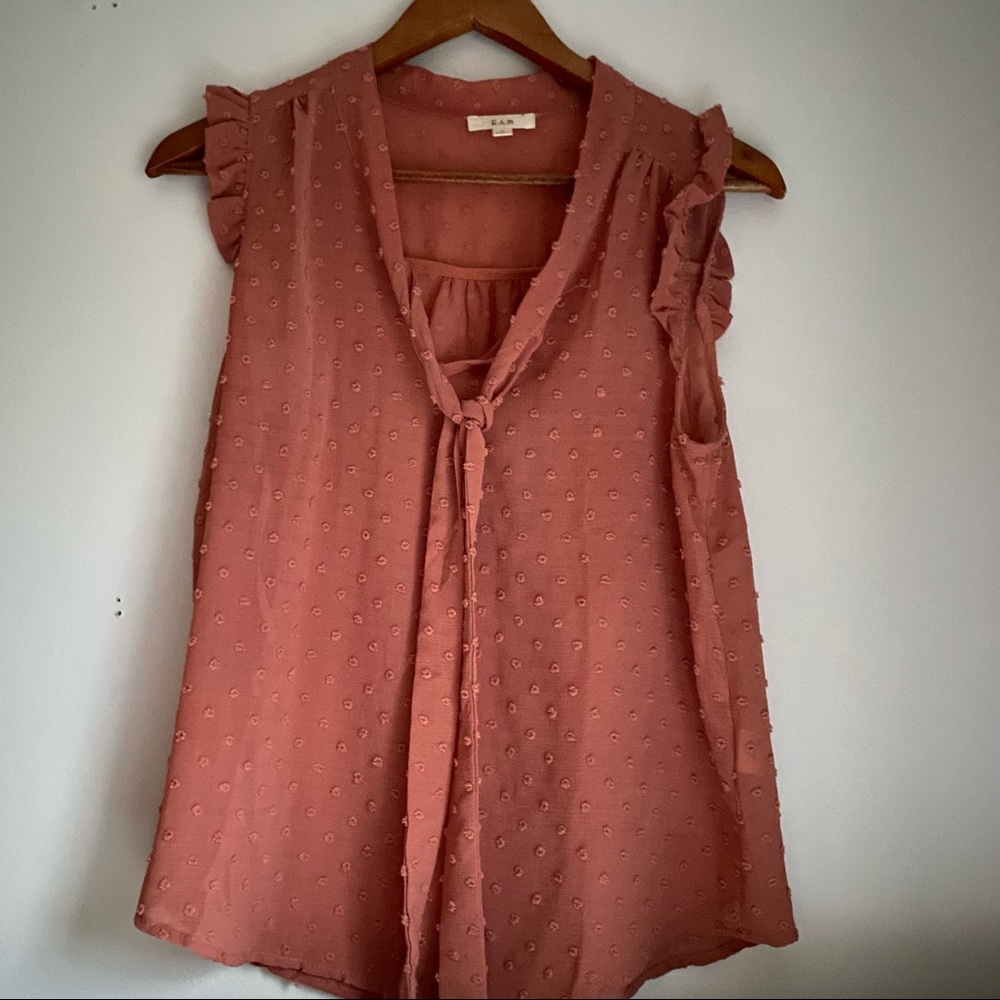 Salmon colored sleeveless top